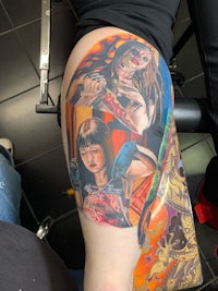 a woman with a tattoo on her thigh